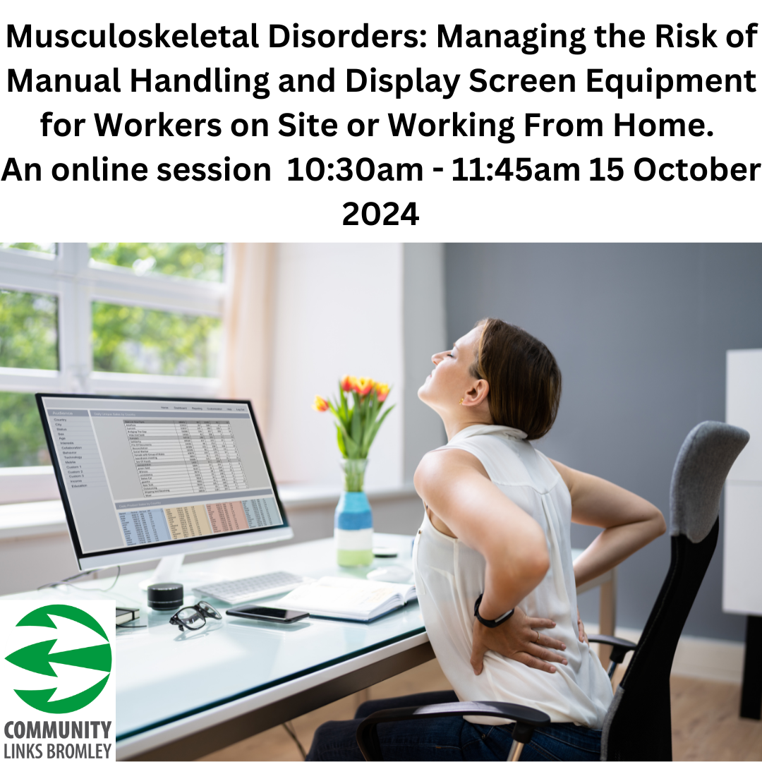 Woman sitting at desk, with hands on back stretching